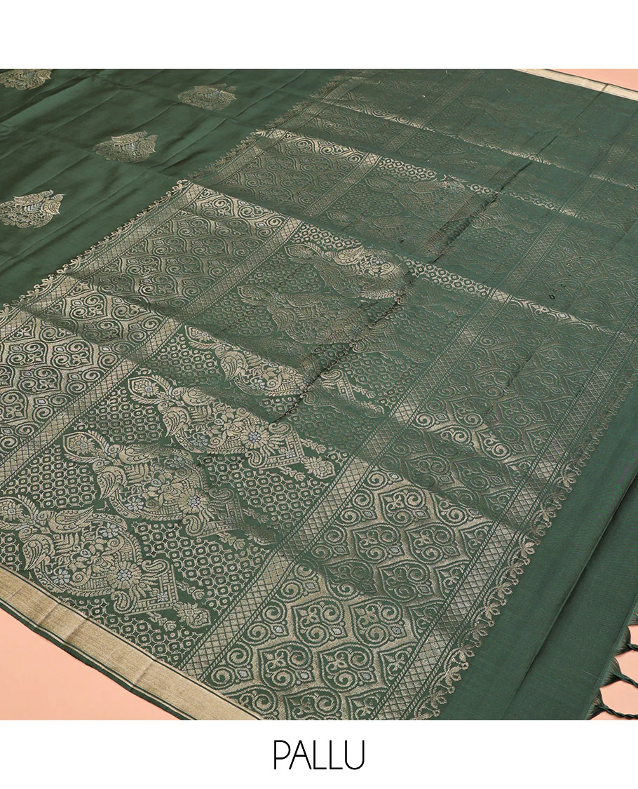 Green Mayuri Soft Silk Saree, Entralled with Zari Buttas All Over Its Body Highlighted iby Zari Piping Border, Intricately Designed Pallu and Paired with a Matching Blouse - Image 5