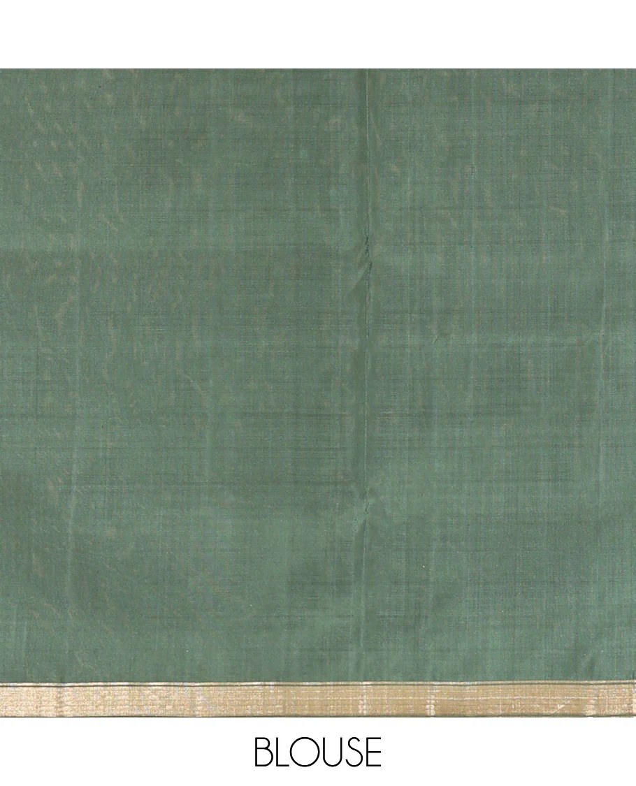 Green Mayuri Soft Silk Saree, Entralled with Zari Buttas All Over Its Body Highlighted iby Zari Piping Border, Intricately Designed Pallu and Paired with a Matching Blouse - Image 6