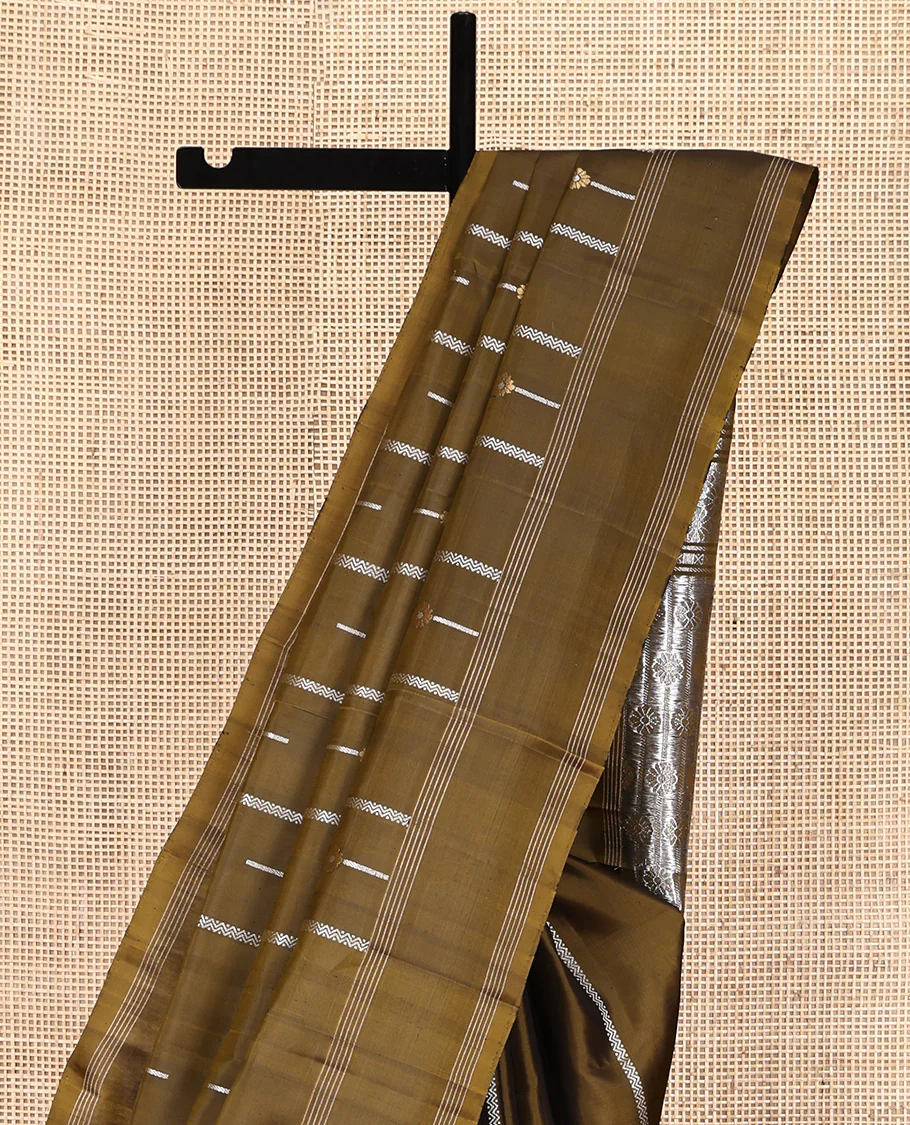 Green Mayuri Soft Silk Saree, Graced with Zari Buttas All Over Its Body, Highlighted by Zari Striped Border, Pallu Steeped with Zari Buttas, and Paired with a Matching Blouse - Image 3