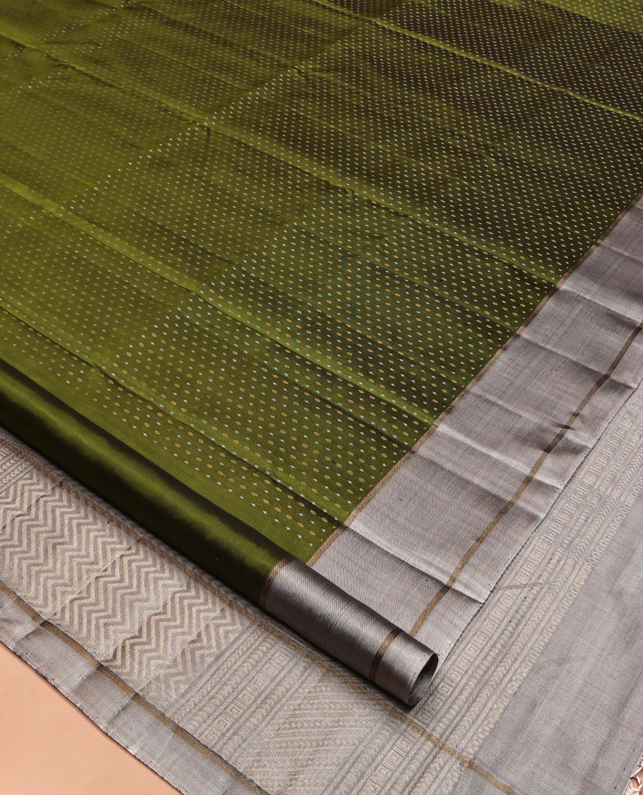 Green Mayuri Soft Silk Saree, Steeped with Buttas All Over Its Body, Complemented by Contrast Border, Pallu of Chevron Stripes, and Paired with a Contrast Blouse - Image 2