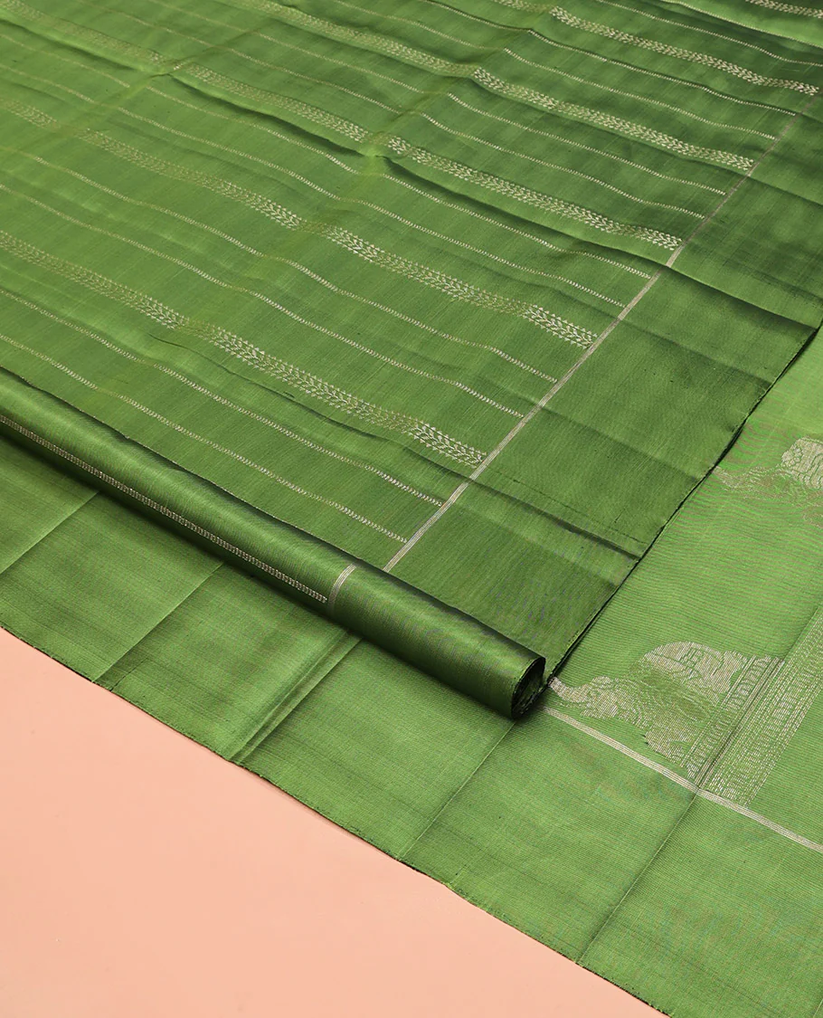 Green Mayuri Soft Silk Saree, Subtly Decked Up Zari Stripes All Over Its Body, Highlighted by Self-Border, Pallu Steeped with Elephant Motifs, and Paired with a Matching Blouse - Image 2