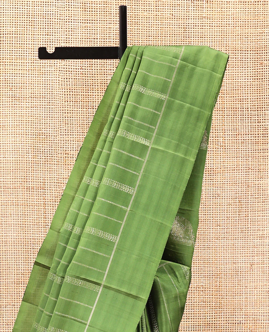 Green Mayuri Soft Silk Saree, Subtly Decked Up Zari Stripes All Over Its Body, Highlighted by Self-Border, Pallu Steeped with Elephant Motifs, and Paired with a Matching Blouse - Image 3