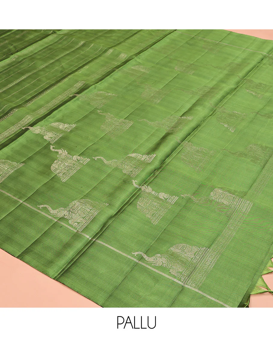 Green Mayuri Soft Silk Saree, Subtly Decked Up Zari Stripes All Over Its Body, Highlighted by Self-Border, Pallu Steeped with Elephant Motifs, and Paired with a Matching Blouse - Image 5