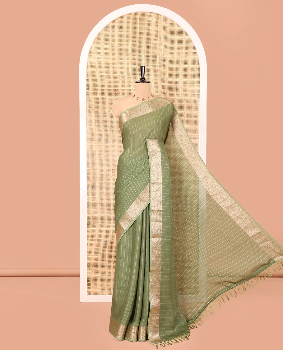 Green Moss Chiffon Saree, Gleamed Up with Vertical Zari Stripes All Over Its Body, Highlighted by a Zari Border of Paisleys and Diamond Designs, a Self-Pallu, and Paired with a Matching Blouse