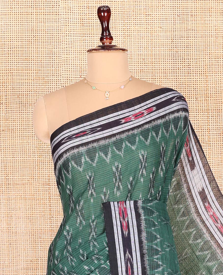 Green Odisha Cotton Saree Showcasing Buttas All Over the Body, Complemented by a Contrast Temple Border of Geometric Patterns, Pallu Depicts Floral Motifs in a Hazily Weave, and Has No Blouse - Image 2