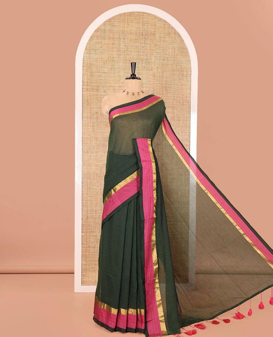 Green Plain Khadi Mul Cotton Saree, Complemented by a Contrast Pink Zari Border, Plain Pallu, and Paired with a Matching Blouse