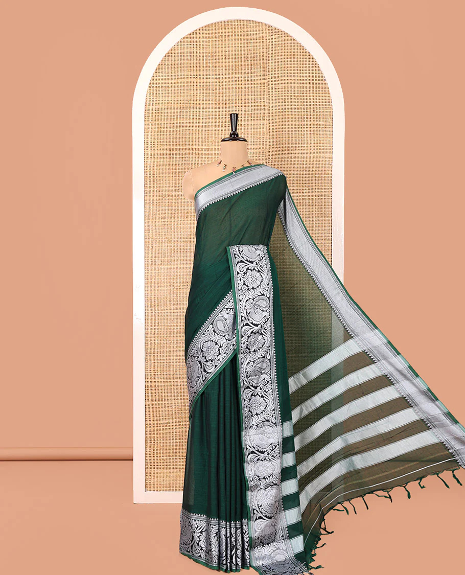 Green Plain Mercerised Cotton Saree, Highlighted by a Self-Border of Temple, Peacock, and Floral Designs,  Striped Pallu, and Paired with a Matching Blouse