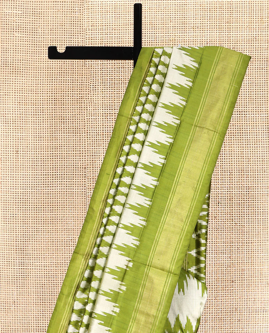 Green Pochampally Ikat Silk Saree, Elevated with Ikkat Buttas on Its Body, Complemented by a Ikkat-Style Woven Temple Border, Pallu of Ogee Patterns, and Paired with a Matching Blouse - Image 3
