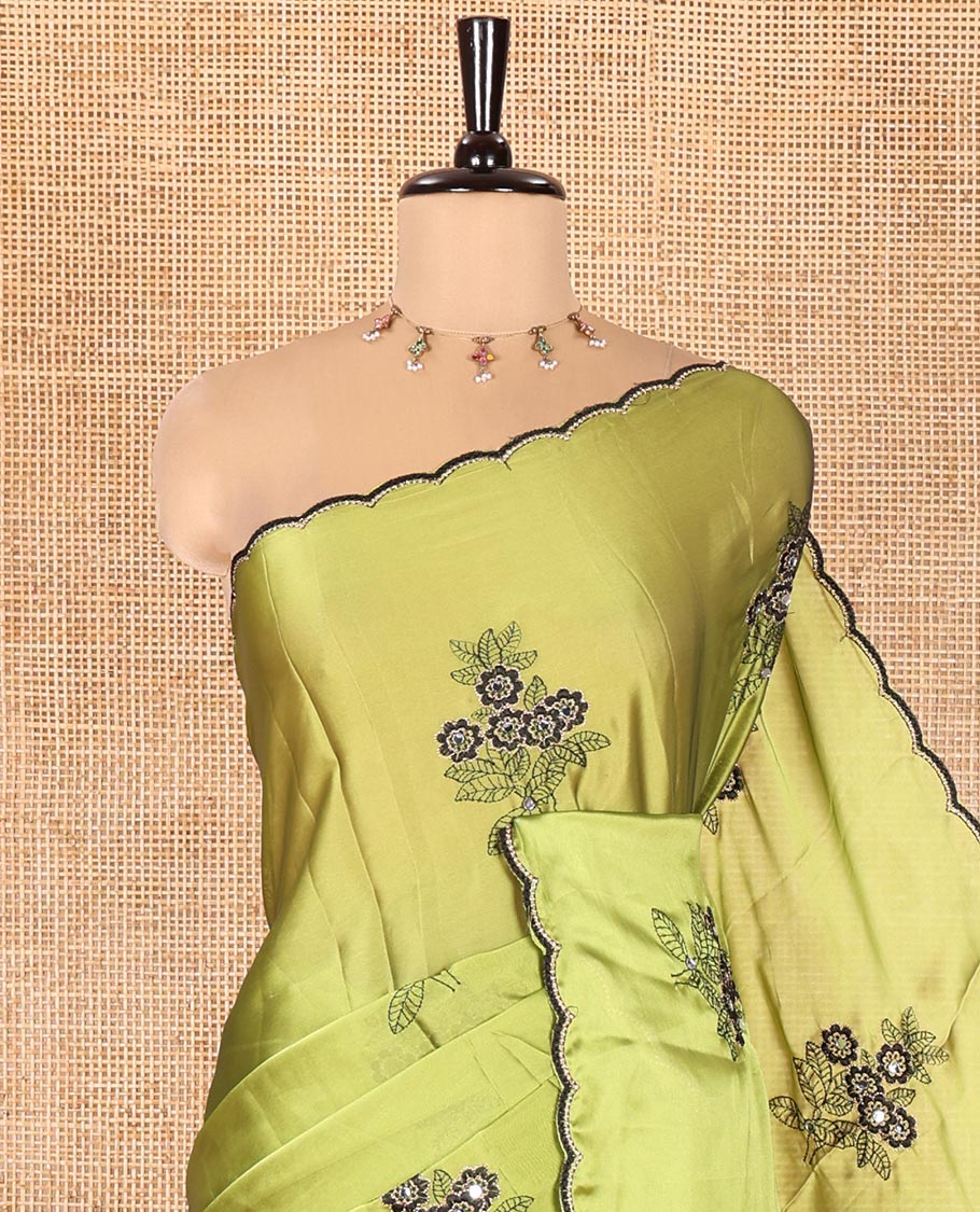 Green Rangoli Chiffon Saree, Elevated with Flower-Style Motifs Embroidered on Its Body, a Subtle Scallop Embroidered Border, a Self-Pallu, and Paired with a Contrast Embroidered Blouse - Image 2