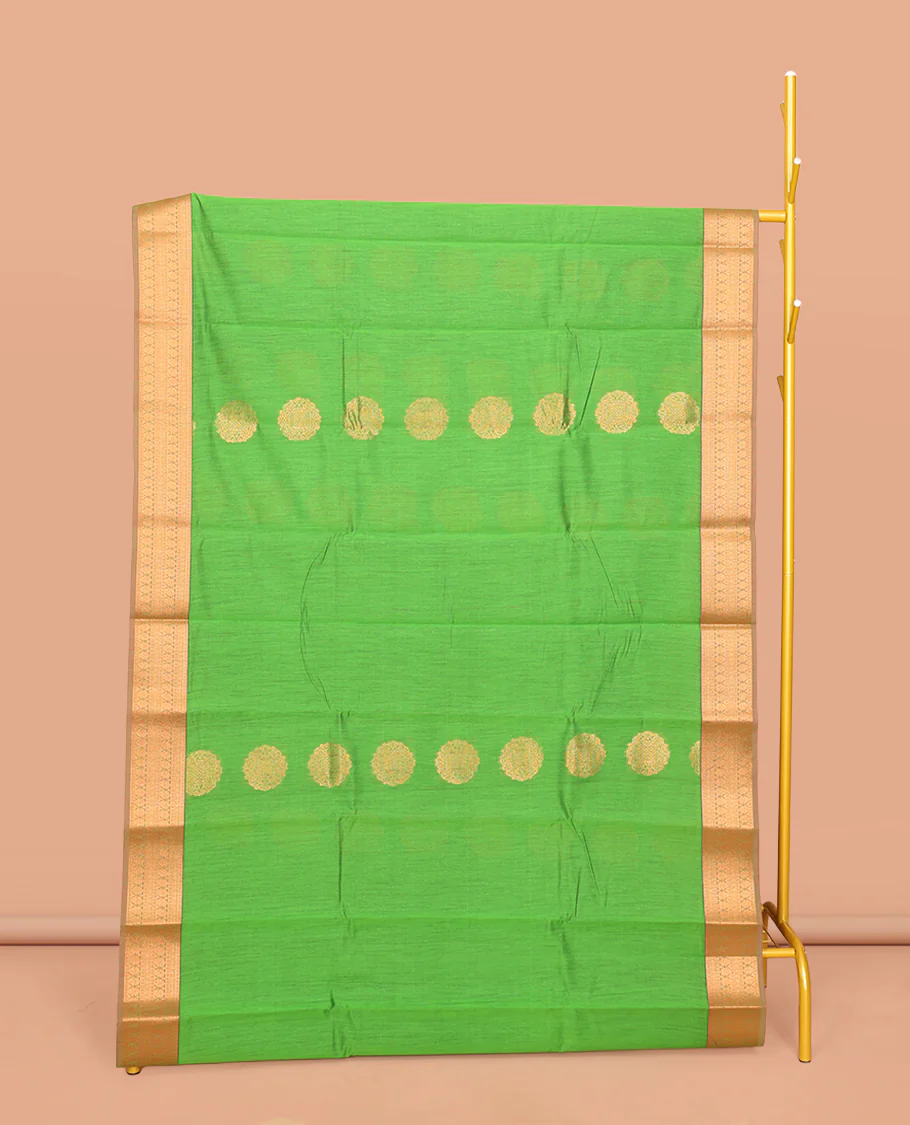 Green Semi-Silk Cotton Saree, Bedecked with Zari Buttas All Over Its Body, Complemented by a Contrast Border of Traditional Zari Designs, Grand Jaal Pallu, and Paired with a Contrast Blouse