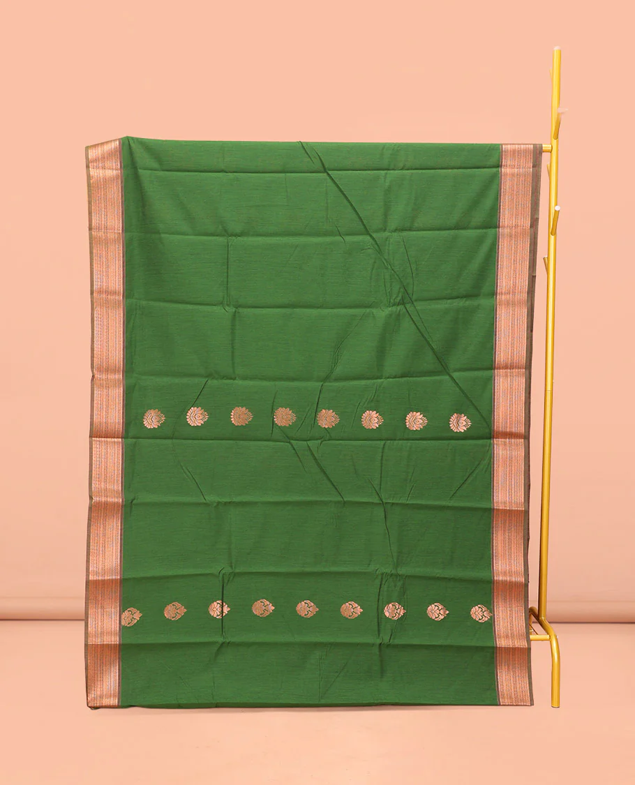 Green Semi-Silk Cotton Saree, Bedecked with Zari Buttas All Over Its Body, Highlighted by a Traditional Zari Border, Pallu of Paisley Designs, and Paired with a Matching Blouse