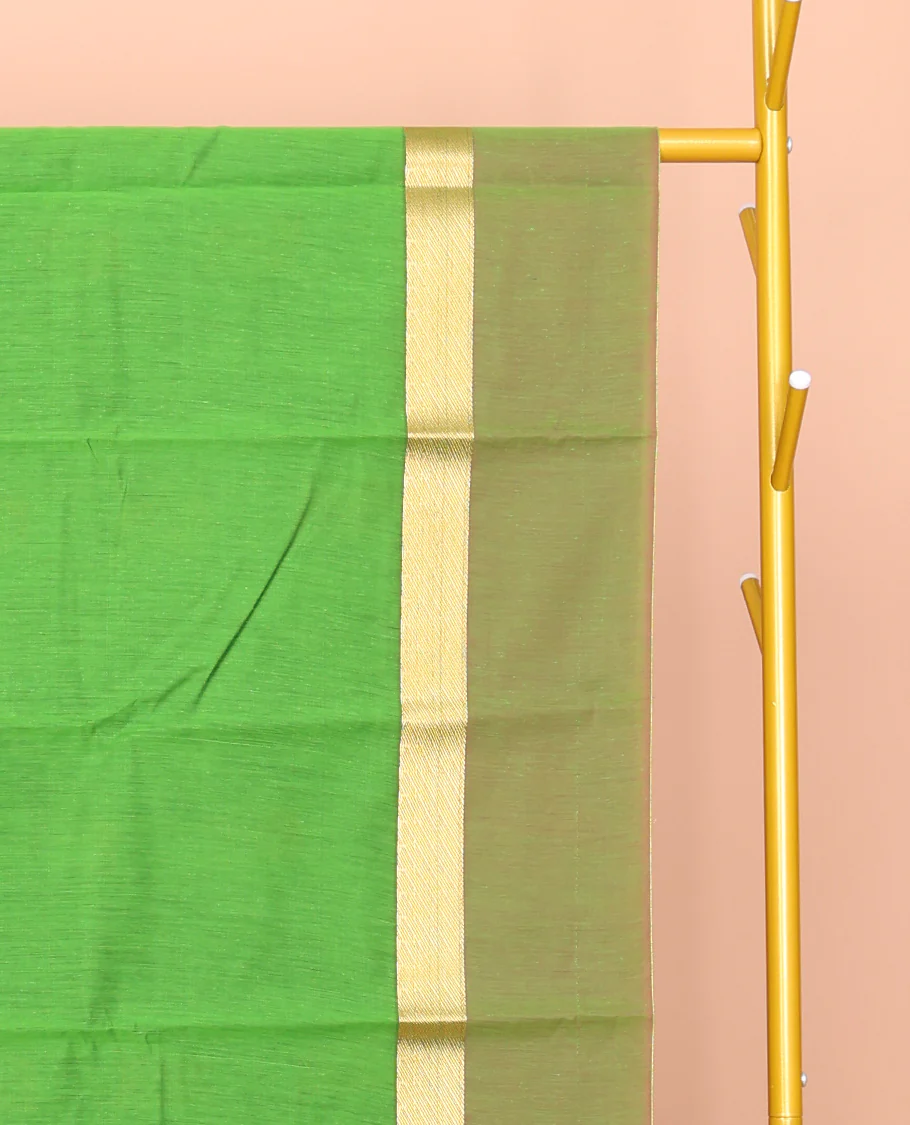Green Semi-Silk Cotton Saree, Decked Up with Peacock Buttas All Over Its Body, Highlighted by a Zari Border, Pallu Artfully Woven with Peacock Designs, and Paired with a Contrast Blouse - Image 2