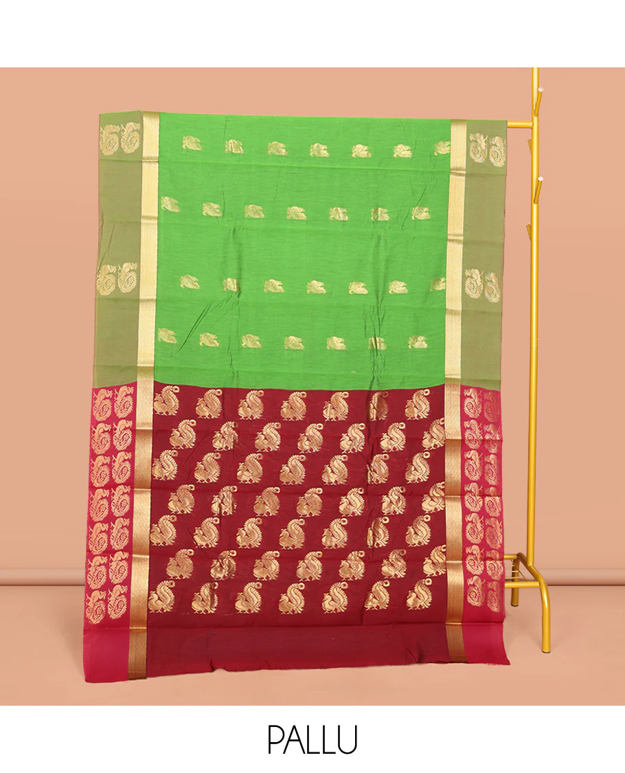 Green Semi-Silk Cotton Saree, Decked Up with Peacock Buttas All Over Its Body, Highlighted by a Zari Border, Pallu Artfully Woven with Peacock Designs, and Paired with a Contrast Blouse - Image 3