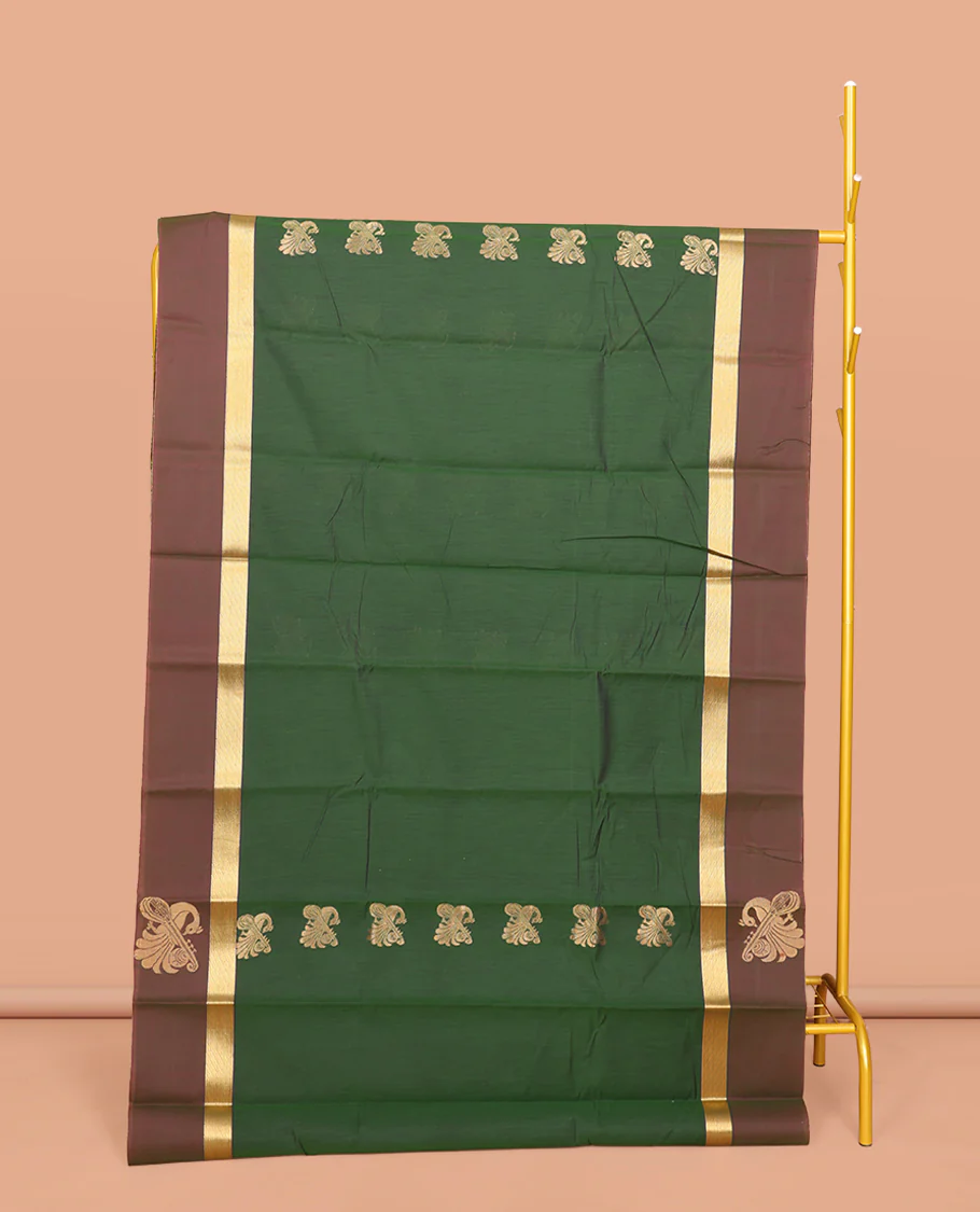 Green Semi-Silk Cotton Saree, Embellished with Zari Buttas All Over Its Body, Complemented by a Contrast Border of Peacock and Veena Designs, Pallu of Peacock Designs, and Paired with a Matching Blouse
