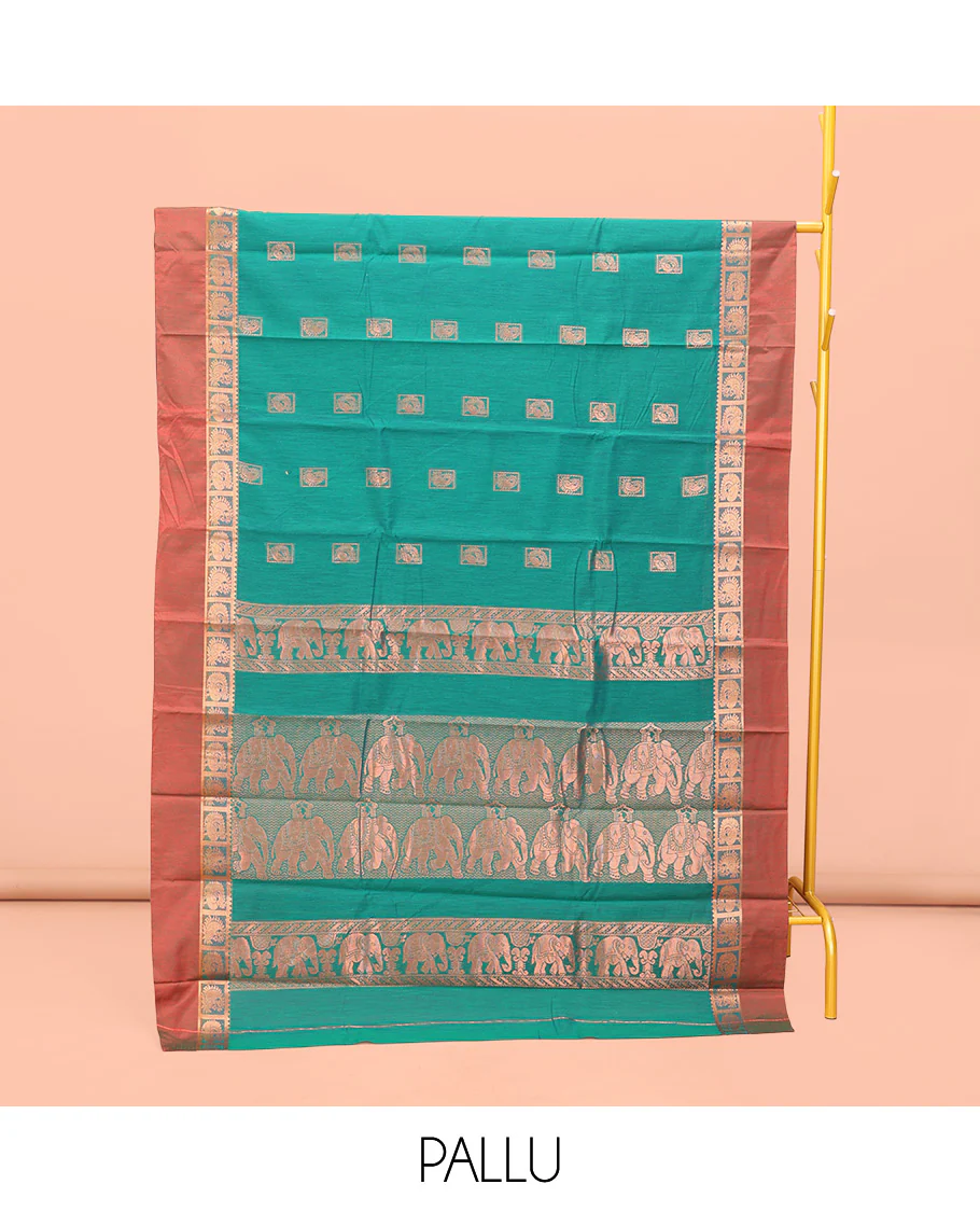 Green Semi-Silk Cotton Saree, Impeccably Styled with Buttas All Over Its Body, Complemented by a Contrast Peacock Design Kal Eragina Border, Pallu Steeped with Elephant Design, and Paired with a Matching Blouse - Image 3