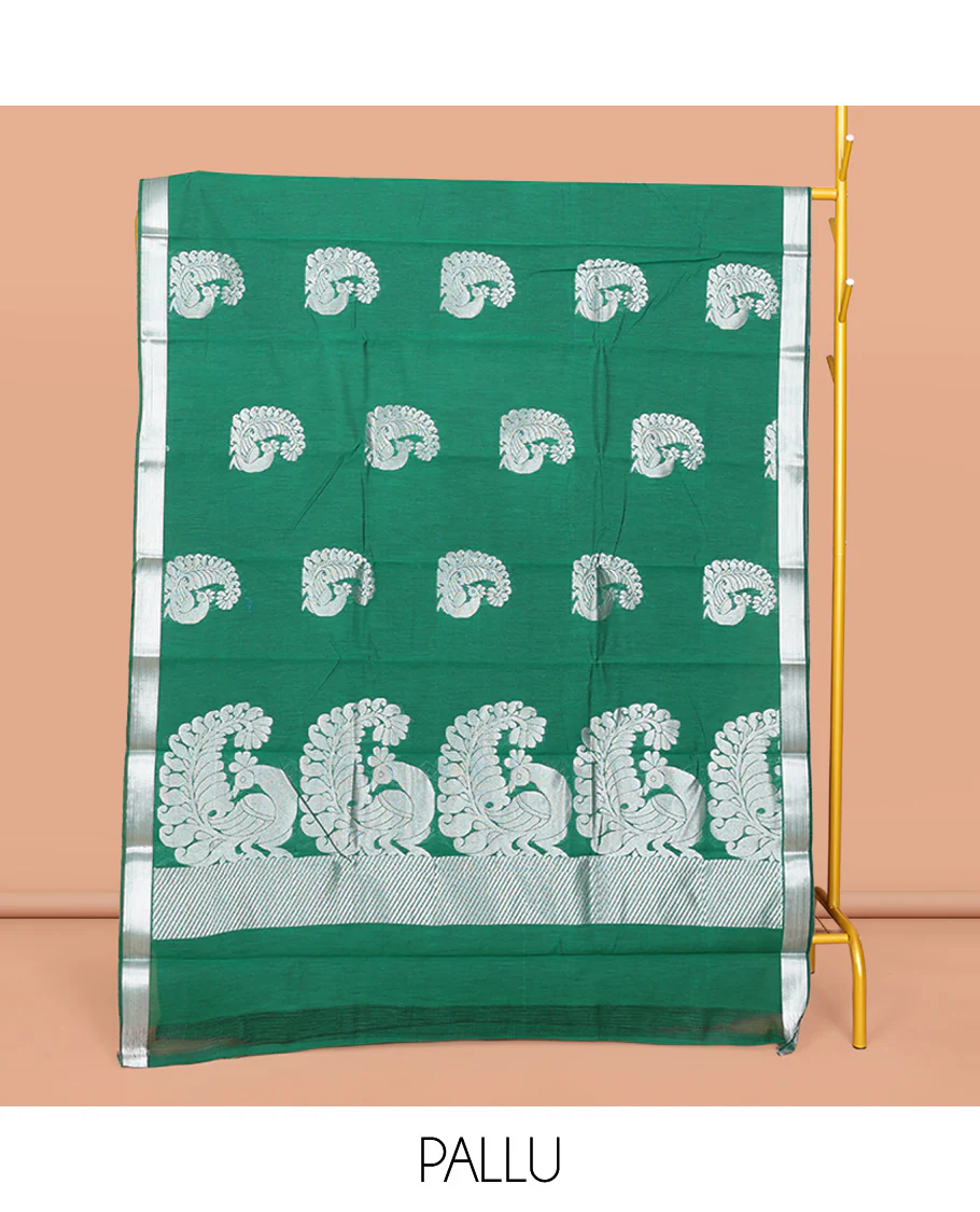 Green Semi-Silk Cotton Saree, Mesmerized with Peacock Buttas All Over Its Body, Highlighted by a Zari Border, Pallu Artfully Woven with Peacock Designs, and Paired with a Matching Blouse - Image 3