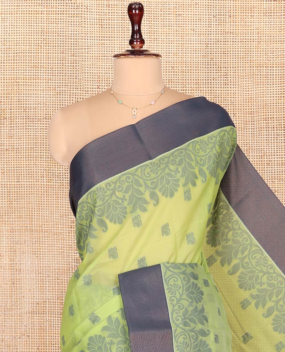 Green Semi-Silk Cotton Saree, Sparsely Woven with Floral Buttas on Its Body, Complemented by Contrast Border, Pallu Steeped with Floral Designs, and Paired with a Matching Blouse - Image 2