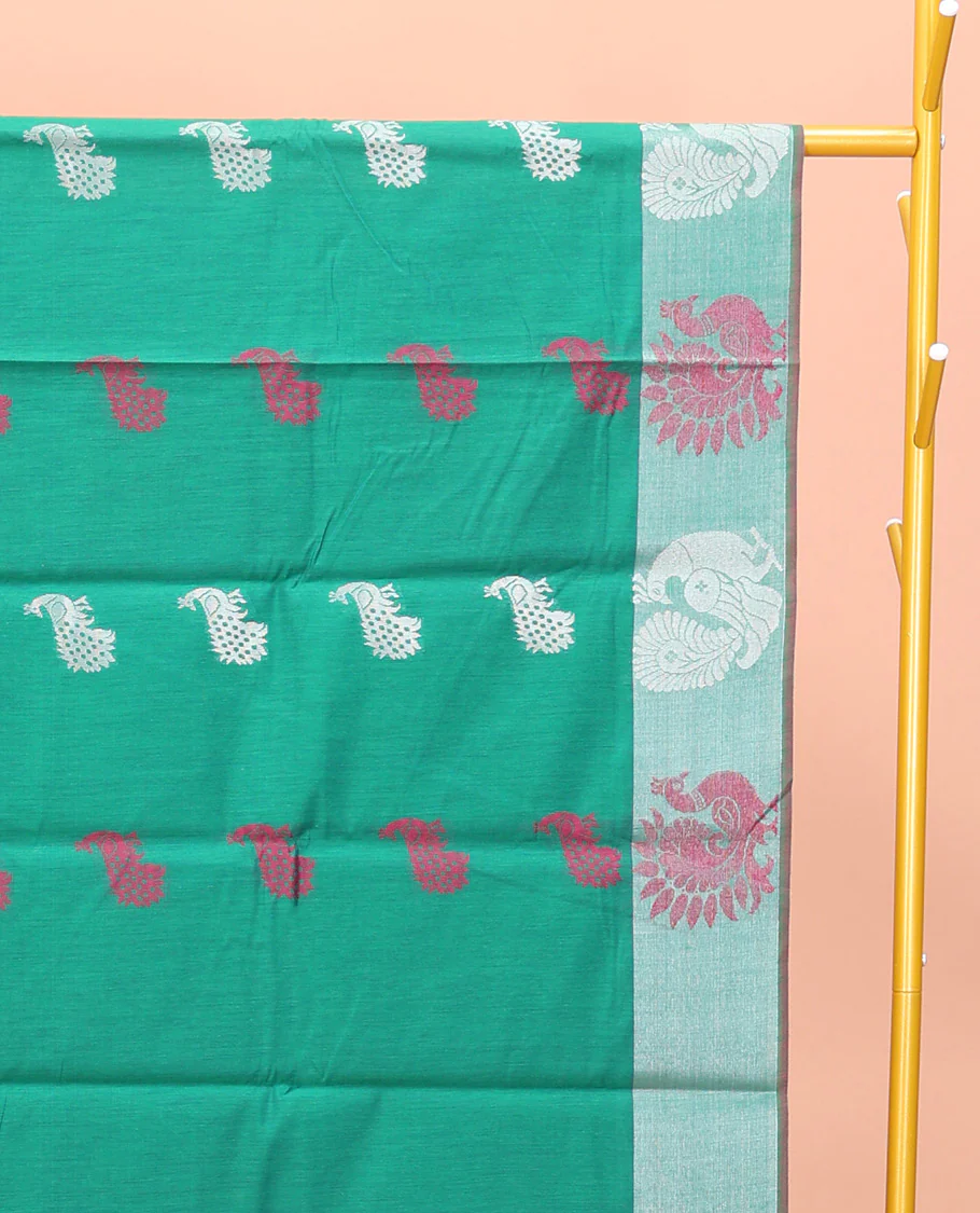 Green Semi-Silk Cotton Saree, Styled with Peacock Buttas All Over Its Body, Highlighted by a Self-Border  of Peacock Designs, Pallu Steeped with Peacock Zari Design, and Paired with a Matching Blouse - Image 2