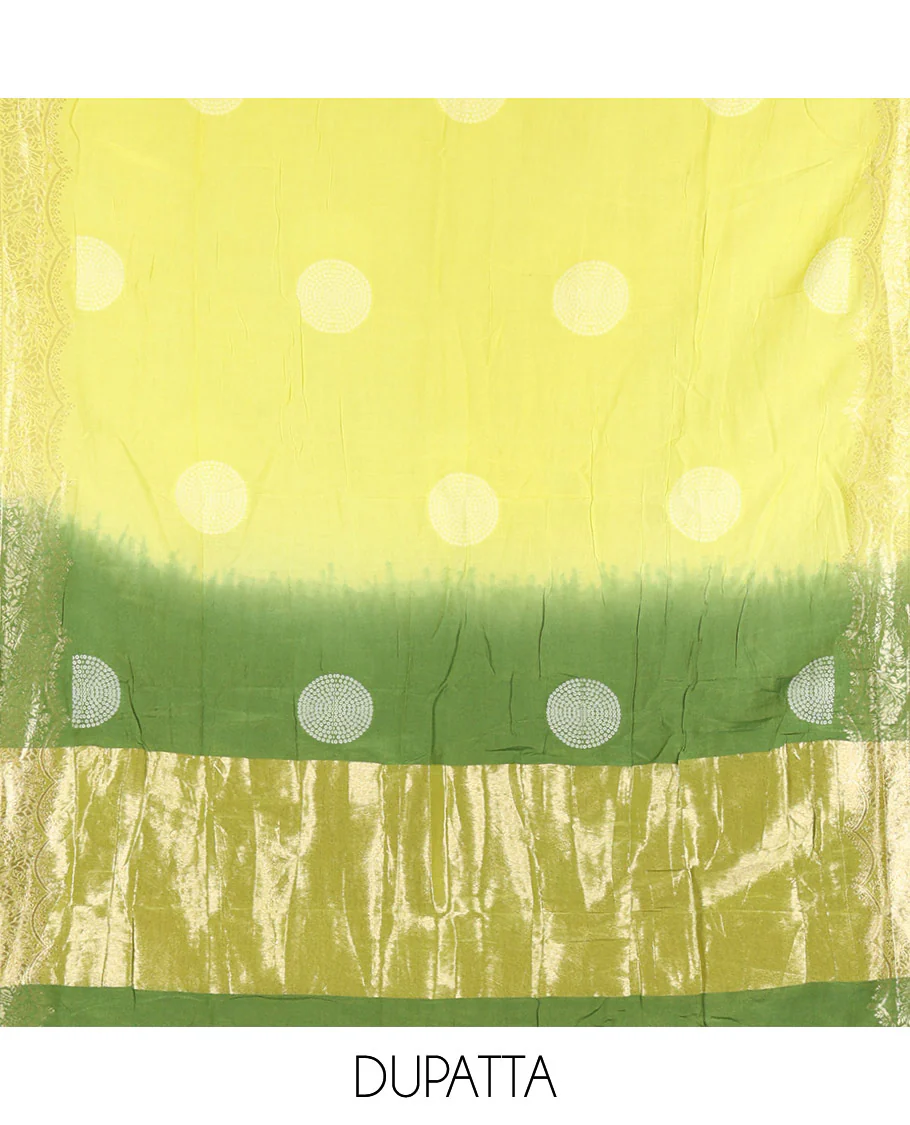 Green Semi Silk Material Churidar Set, Subtly Made Plain Top, a Plain Santoon Bottom, and Is Paired with a Dual-Colored Bandhani Motifs Semi Silk Dupatta - Image 2