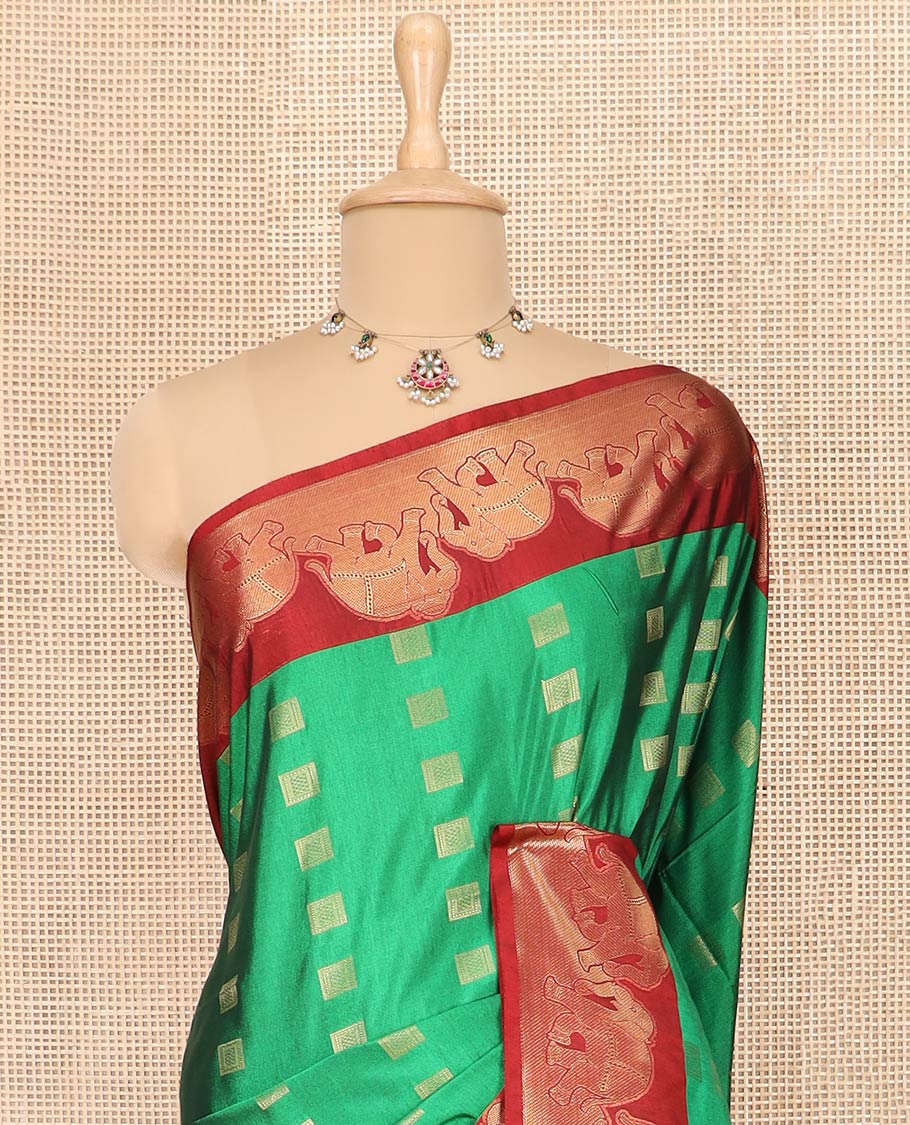 Green Semi-Soft Silk Saree Artfully Detailed with Square-Shaped Buttas Woven All Over Its Body, Complemented by a Contrast Elephant Motifs Zari Border, Pallu Highlighted with Chevron Designs, and Paired with a Contrast Blouse - Image 2