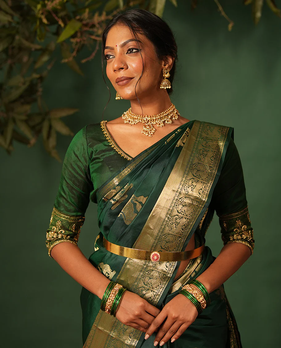 Green singam and yaanai zari buttas woven Vasundhara silk saree, zari border of mayil kann, rudraksham, muthu, mayil, and yaali designs, and intricate pallu - Image 3