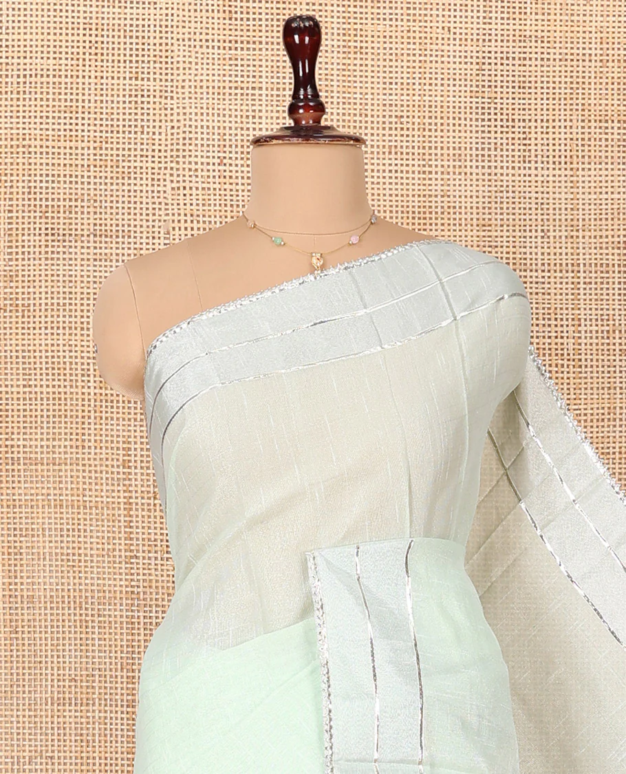 Green Tissue Cotton Saree, Bedecked with Floral Motifs Embroidery on Its Body, Subtle Gota Patti Striped Lace Border, Pallu Elevated with Floral Motifs Embroidery, and Paired with a Matching Blouse - Image 2