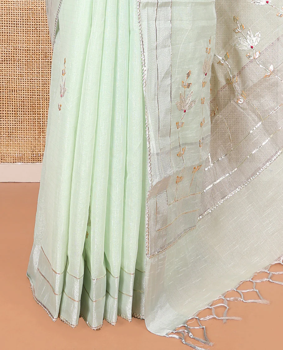 Green Tissue Cotton Saree, Bedecked with Floral Motifs Embroidery on Its Body, Subtle Gota Patti Striped Lace Border, Pallu Elevated with Floral Motifs Embroidery, and Paired with a Matching Blouse - Image 3