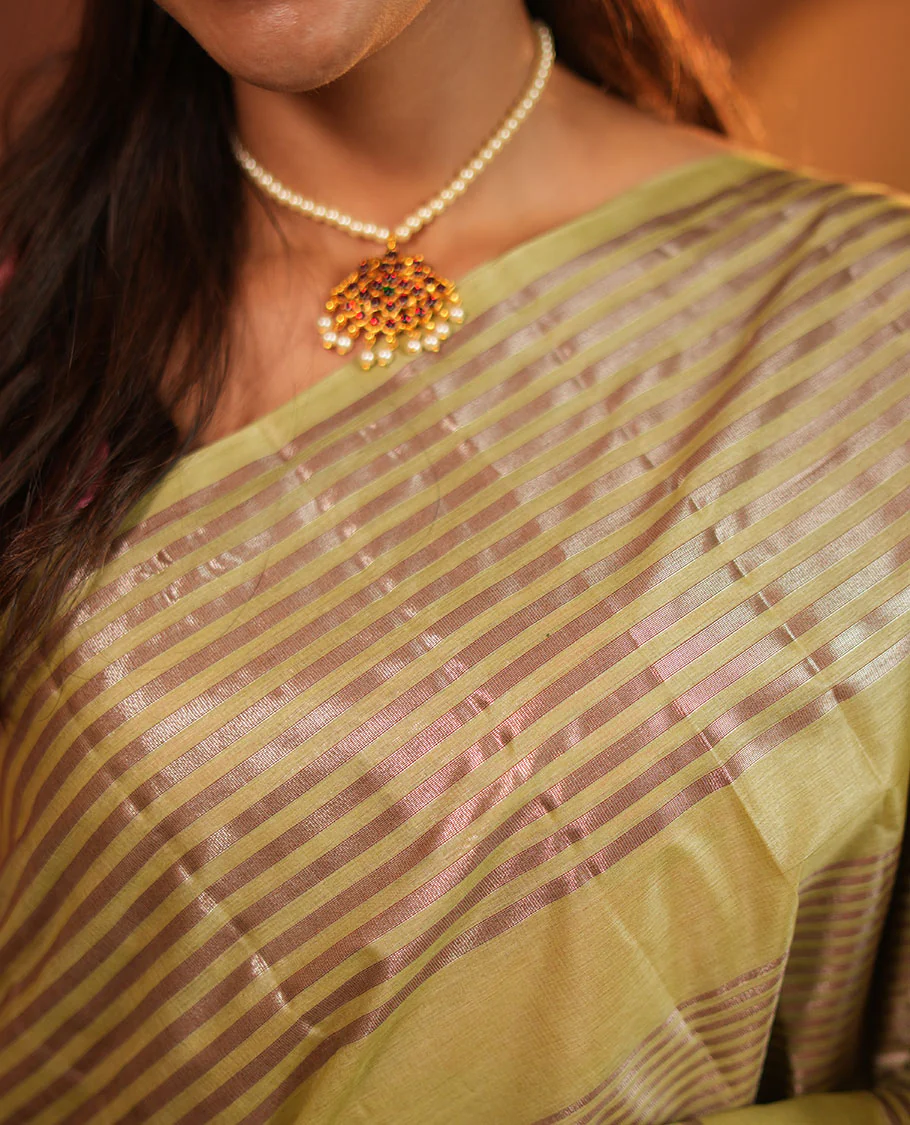 Green Tussar Silk Saree, Highlighted by Horizontal Zari Stripes Running All Over Its Body, Highlighted by Zari Striped Border, Zari Gleamed up Pallu, and Paired with a Matching Blouse - Image 2