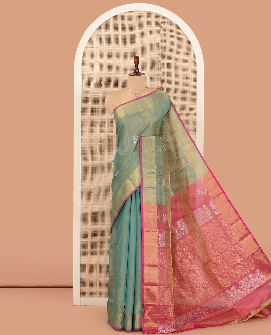 Green Uppada Silk Saree Bedecked with Zari Buttas, Complemented by Bavanji Border, Captivating Contrast Pallu of Floral-Paisley Design Weave, and Paired with a Contrast Blouse