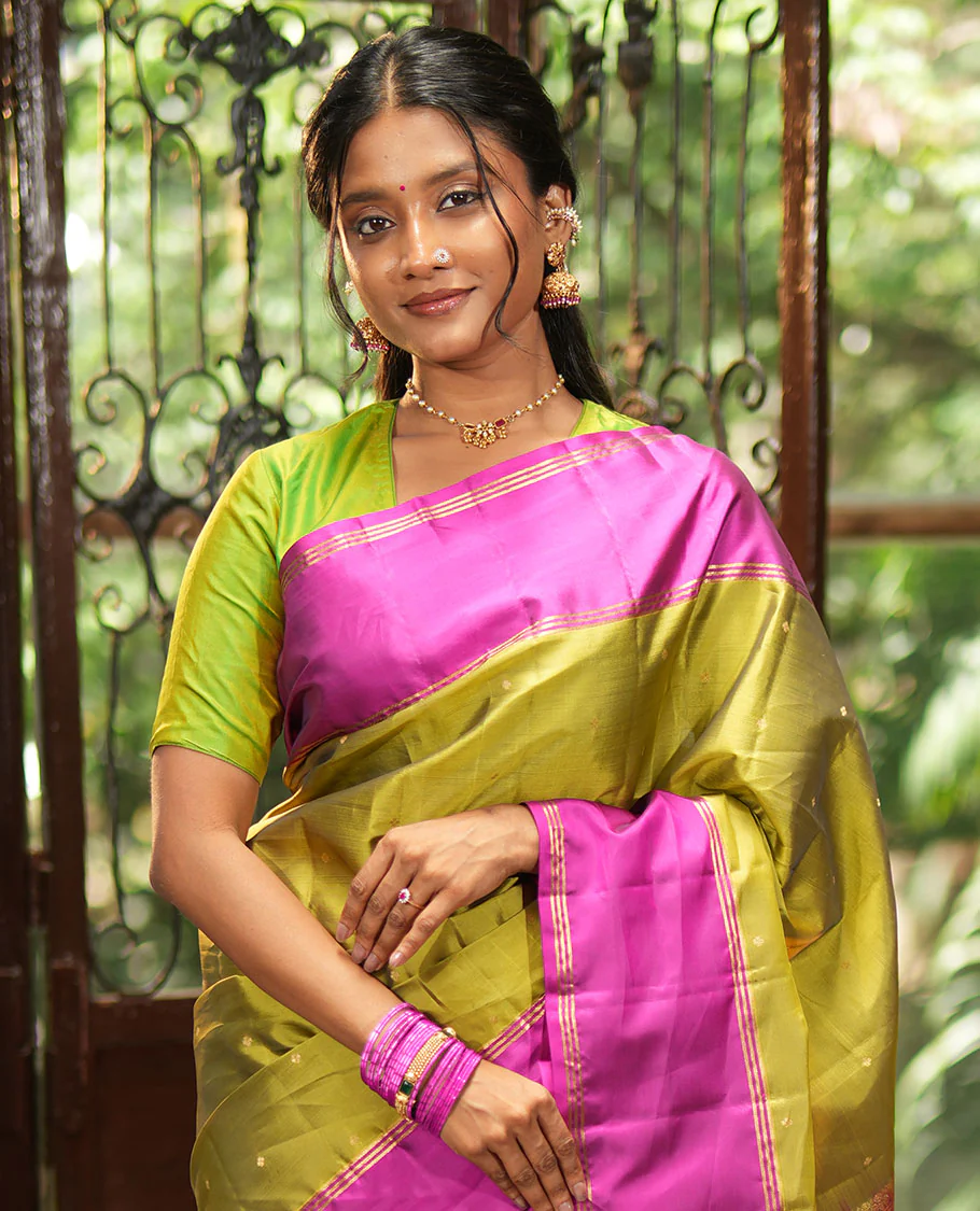 Green Vasundhara Lite-Silk Mix Saree, Beautifully Decorated with Zari Buttas All Over Its Body, Complemented by Contrast Rettai Pettu Border of Zari Stripes, Pallu Accentuated with Jaal Designs, and Paired with a Contrast Blouse - Image 3