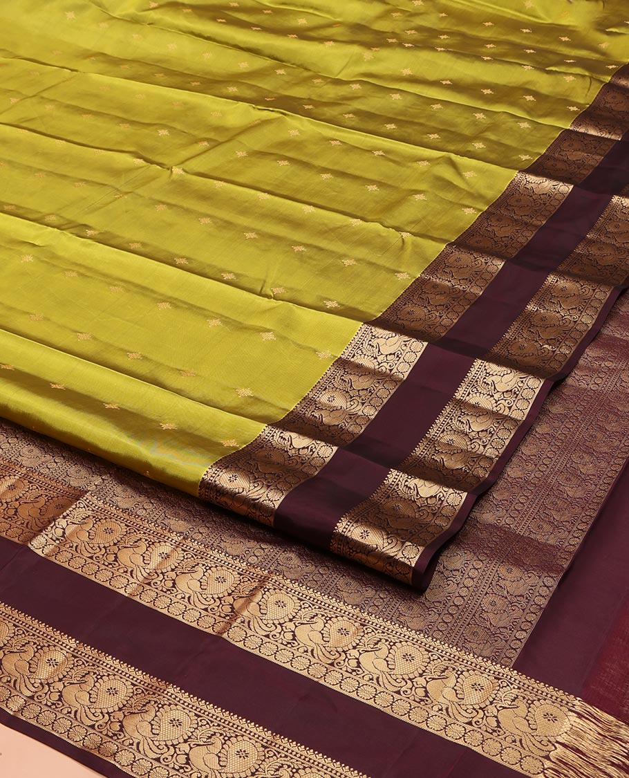 Green Vasundhara Lite Silk Mix Saree, Finely Crafted with Zari Buttas on Its Body, Complemented by Contrast Rettai Pettu Border of Mayil and Laddu Kamalam Designs, Pallu Mirrors the Same Designs, and Paired with a Contrast Blouse - Image 2