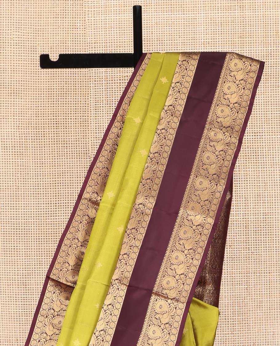Green Vasundhara Lite Silk Mix Saree, Finely Crafted with Zari Buttas on Its Body, Complemented by Contrast Rettai Pettu Border of Mayil and Laddu Kamalam Designs, Pallu Mirrors the Same Designs, and Paired with a Contrast Blouse - Image 3