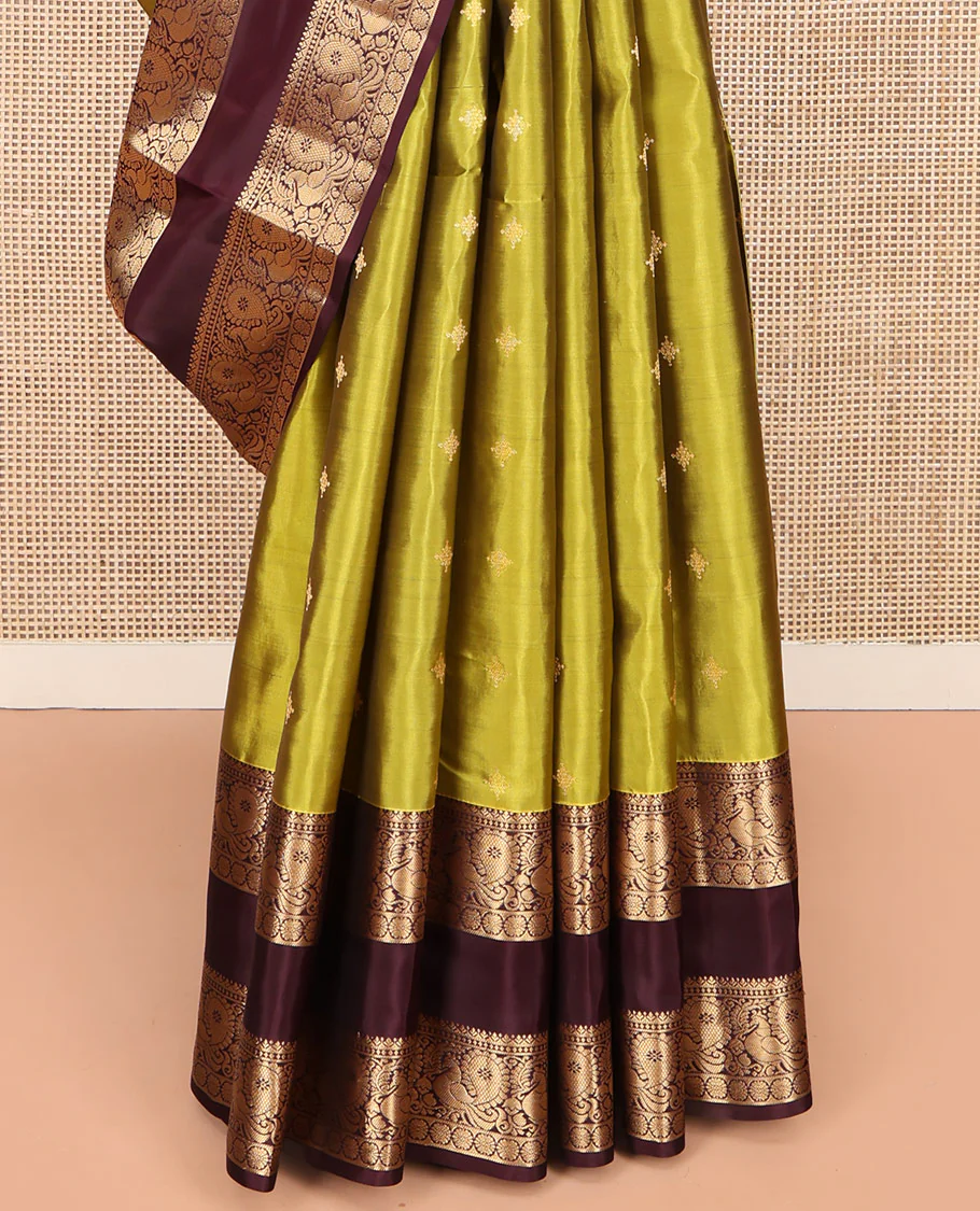 Green Vasundhara Lite Silk Mix Saree, Finely Crafted with Zari Buttas on Its Body, Complemented by Contrast Rettai Pettu Border of Mayil and Laddu Kamalam Designs, Pallu Mirrors the Same Designs, and Paired with a Contrast Blouse - Image 4