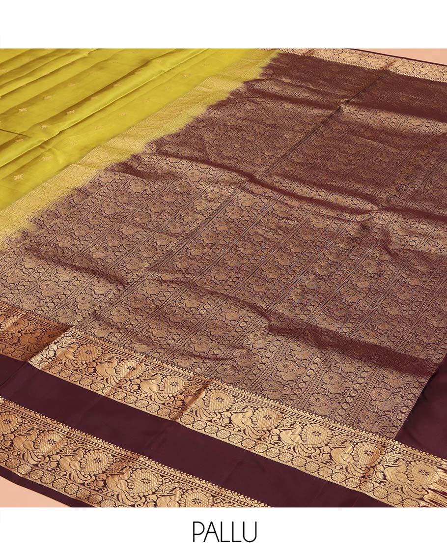 Green Vasundhara Lite Silk Mix Saree, Finely Crafted with Zari Buttas on Its Body, Complemented by Contrast Rettai Pettu Border of Mayil and Laddu Kamalam Designs, Pallu Mirrors the Same Designs, and Paired with a Contrast Blouse - Image 5