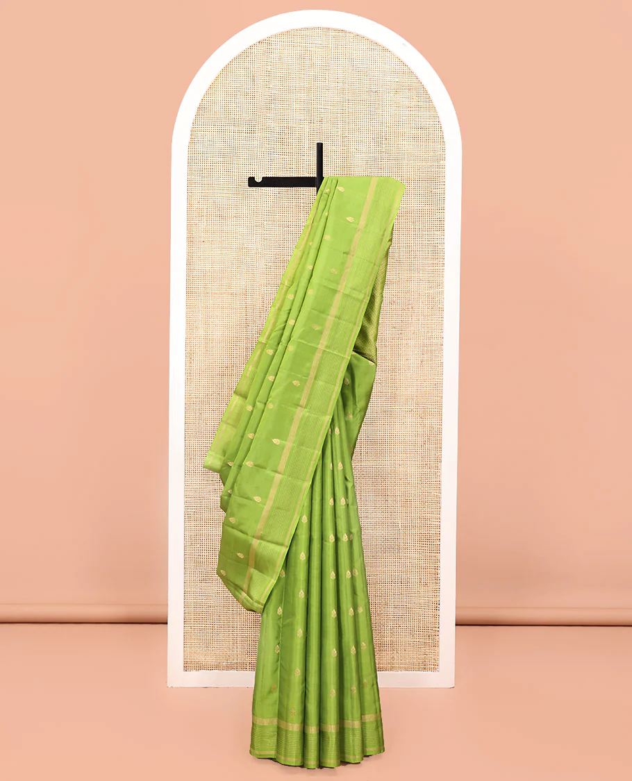 Green Vasundhara Lite Silk Mix Saree, Subtly Sparkled with Zari Buttas All Over Its Body, Highlighted by a Zari Striped Border, Jaal-Patterned Pallu, and Paired with a Matching Blouse