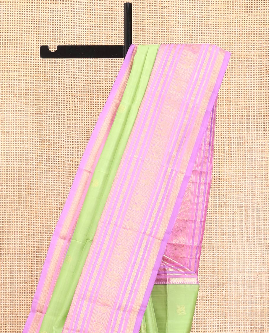 Green Vasundhara Silk Saree, Accentuated with Mayil and Chakram Buttas All Over Its Body, Complemented by a Contrast Border of Rekku, Muthu, Kathir, Poun, Mayil and Mayil Kann Designs, Grand Pallu, and Paired with a Contrast Blouse - Image 3
