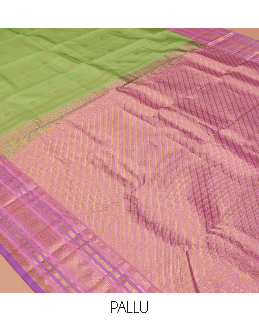 Green Vasundhara Silk Saree, Accentuated with Mayil and Chakram Buttas All Over Its Body, Complemented by a Contrast Border of Rekku, Muthu, Kathir, Poun, Mayil and Mayil Kann Designs, Grand Pallu, and Paired with a Contrast Blouse - Image 5