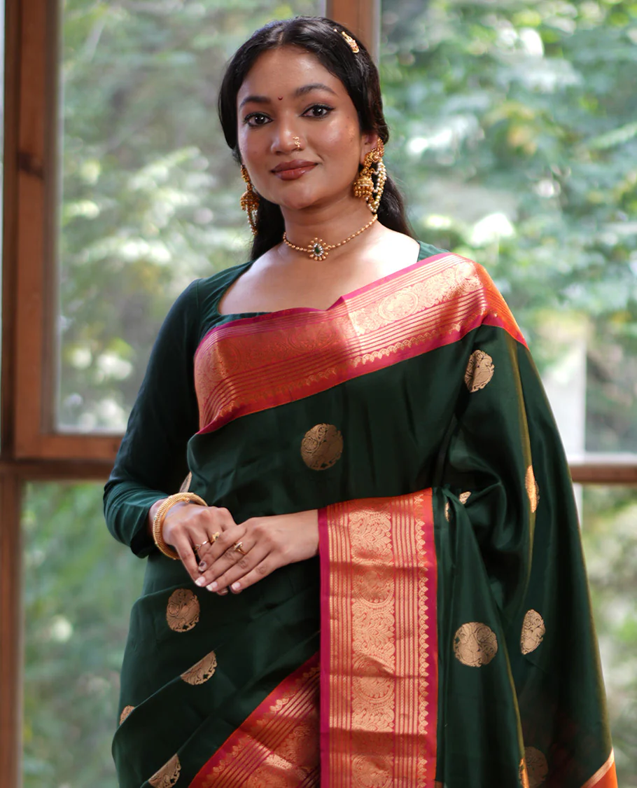 Green Vasundhara Silk Saree, Elevated with Mayil Zari Buttas All Over Its Body, Complemented by a Contrast Border of Thilakam Mokku, Kathir, and Round Mayil Designs, Grand Jaal Pallu, and Paired with a Contrast Blouse - Image 2