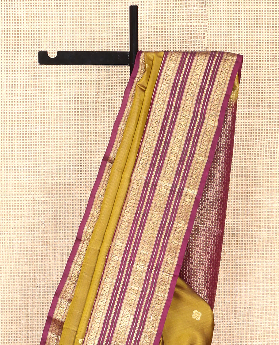 Green Vasundhara Silk Saree, Embellished with Zari Buttas All Over Its Body, Complemented by Contrast Border of Rekku, Muthu, Kathir, And Mayil Designs, Paiyadi Kattam Pallu, and Paired with a Contrast Blouse - Image 3