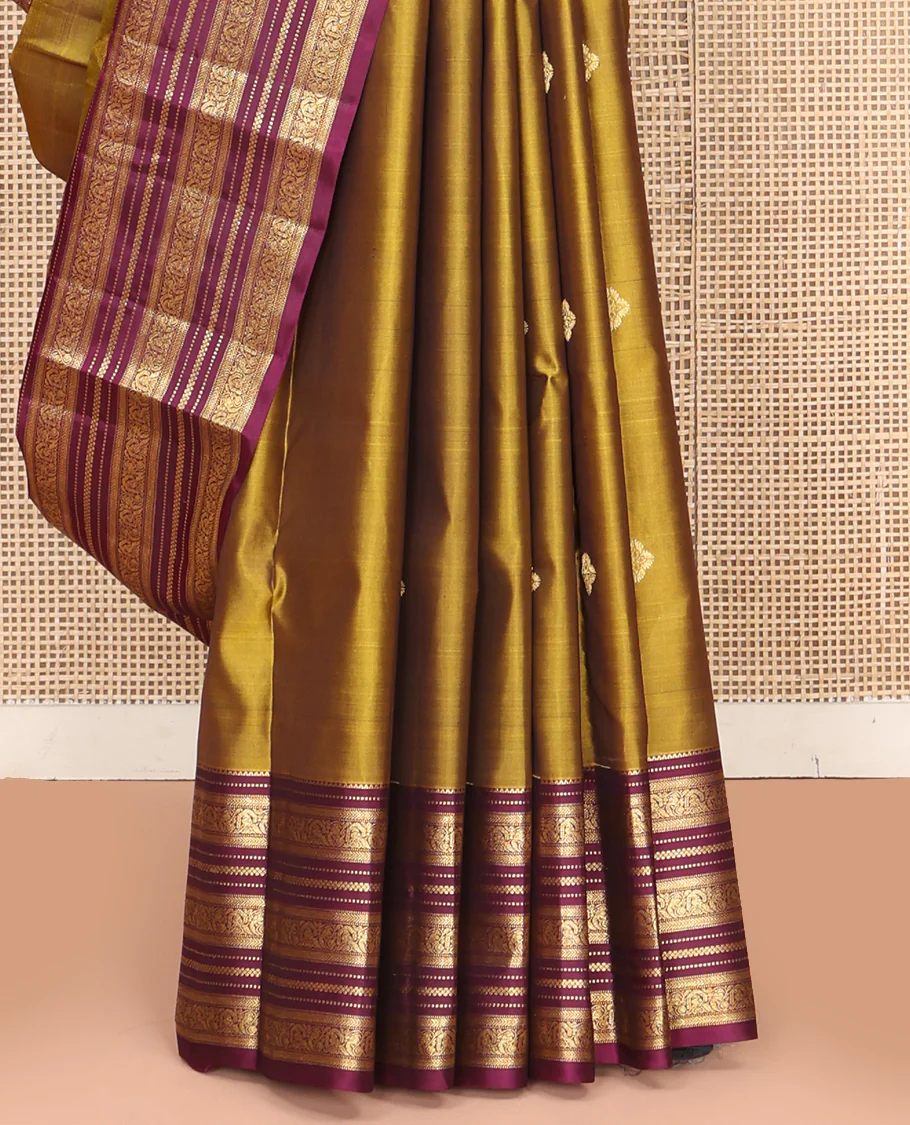Green Vasundhara Silk Saree, Embellished with Zari Buttas All Over Its Body, Complemented by Contrast Border of Rekku, Muthu, Kathir, And Mayil Designs, Paiyadi Kattam Pallu, and Paired with a Contrast Blouse - Image 4