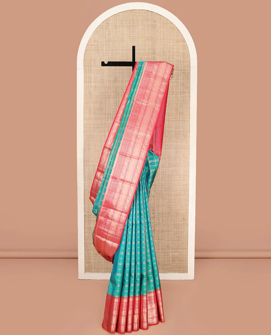 Green Vasundhara Silk Saree, Enriched with Zari Checked Designs All Over Its Body, Complemented by a Contrast Border of Manga, Muthu, Banaras, Rudraksham, and Yaali Designs, Grand Jaal Pallu, and Paired with a Contrast Blouse