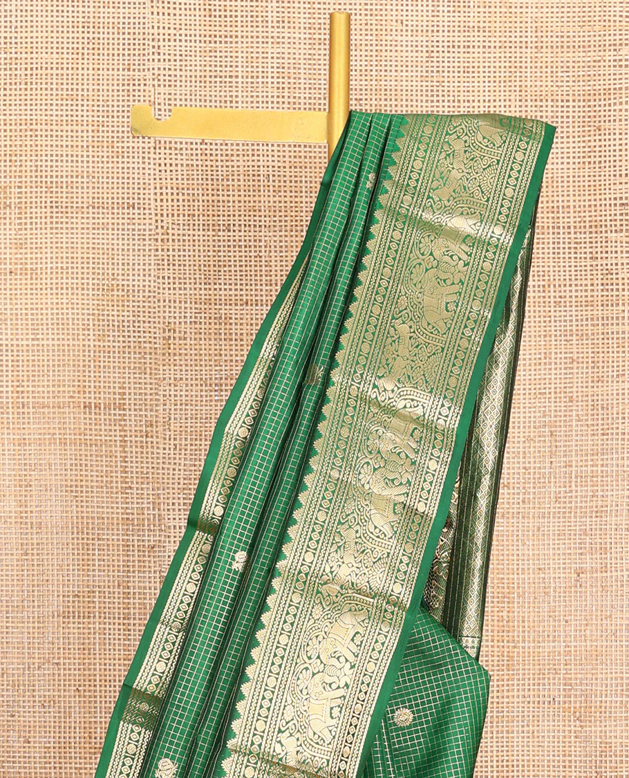 Green Vasundhara Silk Saree Gleamed Up with Zari Checks and Annam Chakram Buttas, Complemented by a Zari Border of Thazampoo Rekku, Neli, Rudraksham, Diamond and Yaanai Designs, Zari Embellished Pallu of Jaal Designs, and Paired with a Matching Blouse - Image 3
