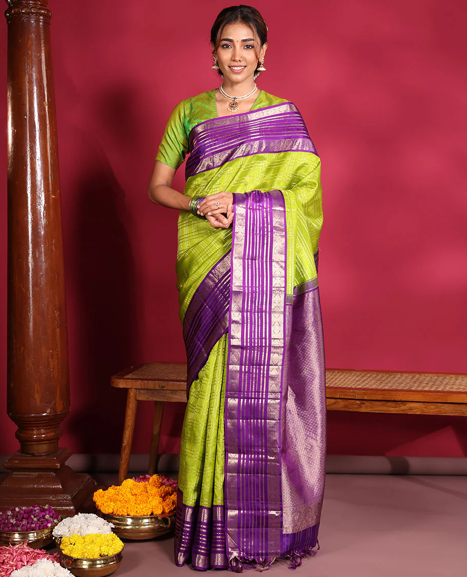 Green Vasundhara Silk Saree, Spotlighted with Zari Checked Design All Over Its Body, Complemented by a Contrast Varisai Pettu Border of Muthu, Poun, and Chakram Designs, Grandly Embellished Pallu of Jaal Designs, and Paired with a Contrast Blouse - Image 5