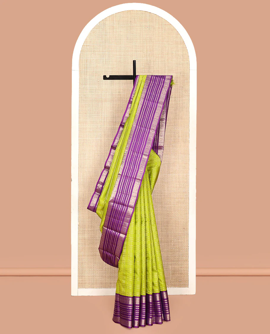 Green Vasundhara Silk Saree, Spotlighted with Zari Checked Design All Over Its Body, Complemented by a Contrast Varisai Pettu Border of Muthu, Poun, and Chakram Designs, Grandly Embellished Pallu of Jaal Designs, and Paired with a Contrast Blouse - Image 6