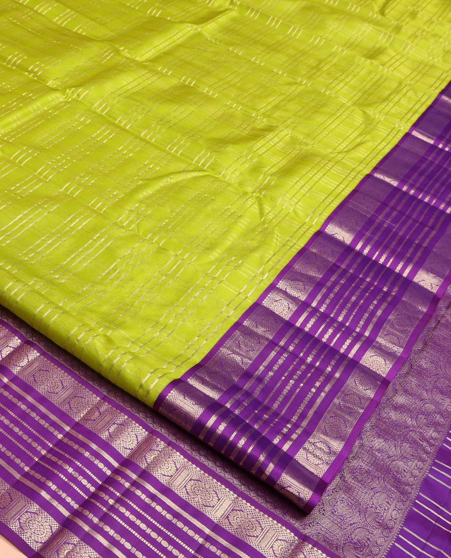 Green Vasundhara Silk Saree, Spotlighted with Zari Checked Design All Over Its Body, Complemented by a Contrast Varisai Pettu Border of Muthu, Poun, and Chakram Designs, Grandly Embellished Pallu of Jaal Designs, and Paired with a Contrast Blouse - Image 7