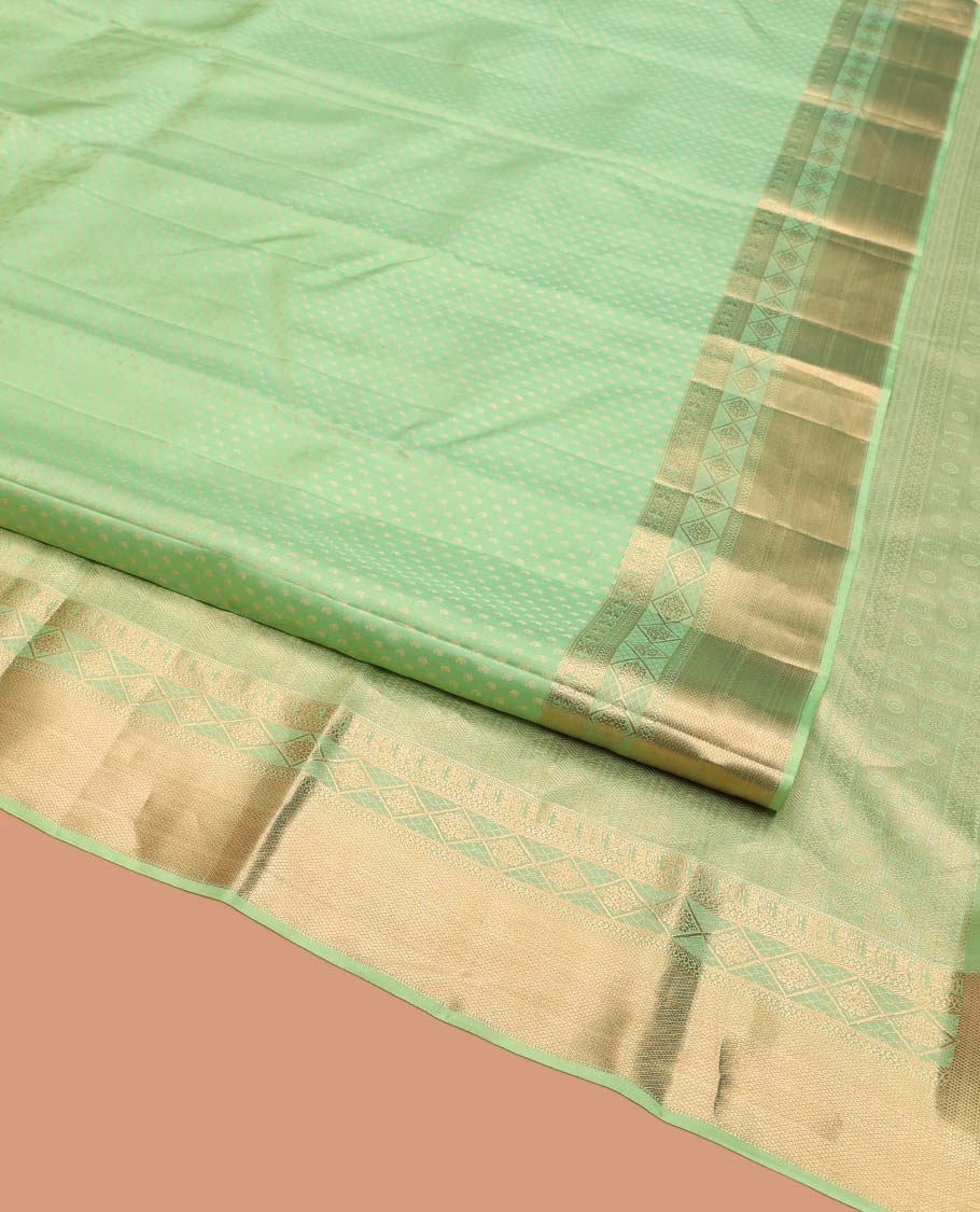 Green Vasundhara Silk Saree, Steeped with Zari Buttas on Its Body, Highlighted by a Zari Border of Traditional Designs, Richly Woven Jaal Pallu, and Paired with a Matching Blouse - Image 2