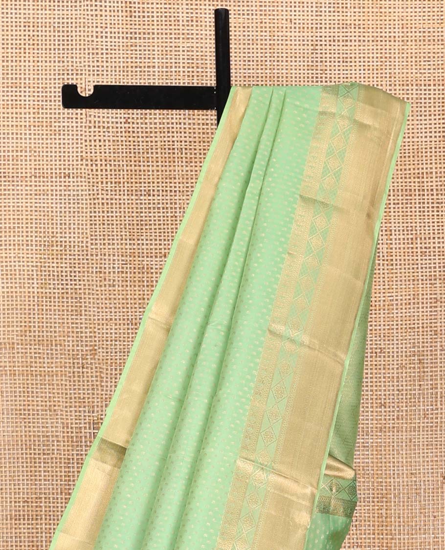 Green Vasundhara Silk Saree, Steeped with Zari Buttas on Its Body, Highlighted by a Zari Border of Traditional Designs, Richly Woven Jaal Pallu, and Paired with a Matching Blouse - Image 3