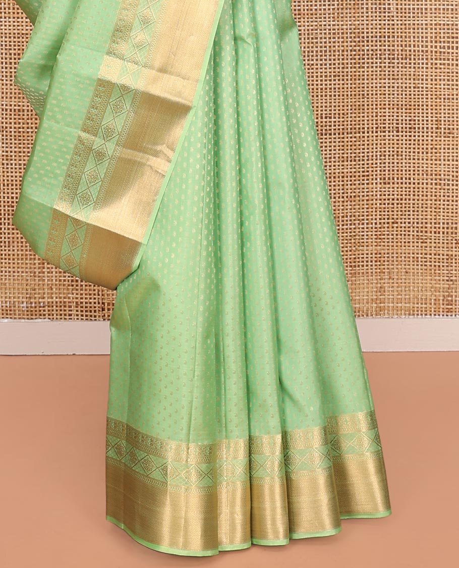 Green Vasundhara Silk Saree, Steeped with Zari Buttas on Its Body, Highlighted by a Zari Border of Traditional Designs, Richly Woven Jaal Pallu, and Paired with a Matching Blouse - Image 4
