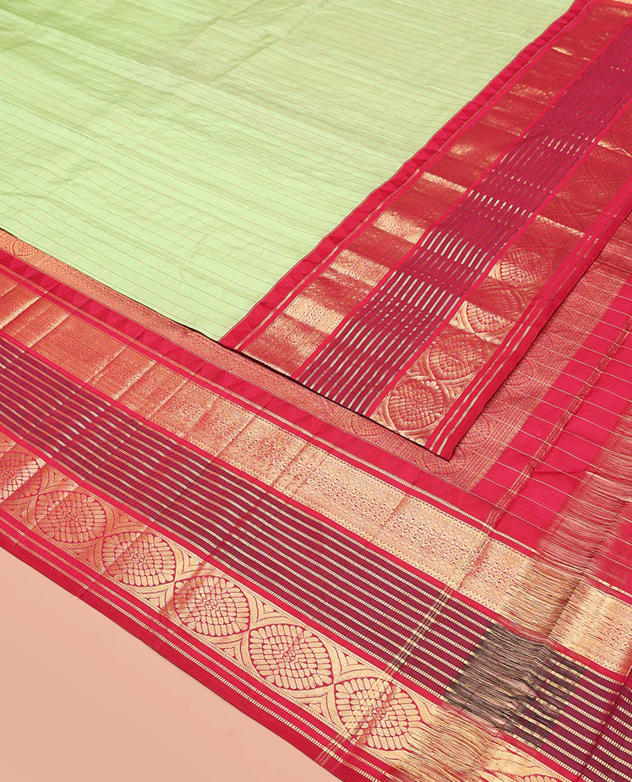 Green Vasundhara Silk Saree Subtly Sparkled with Stripes, Highlighted by a Contrast Border of Muthu, Diamond, Kamalam, and Laddu Kamalam Designs, Delicately Woven Pallu of Intricate Designs, and Paired with a Contrast Blouse - Image 2