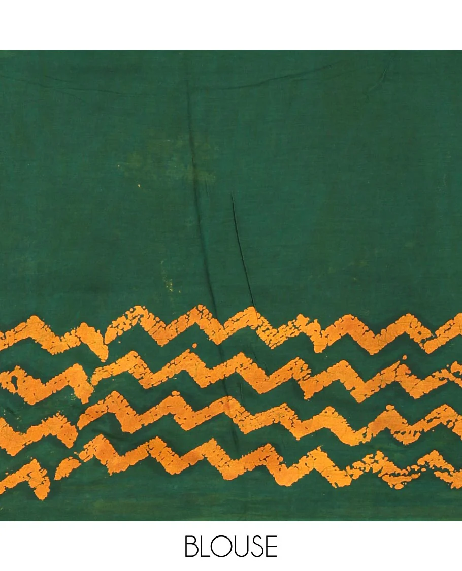 Green wax batik-style zig-zag printed pure cotton saree, gold zari piping border, human figurines batik printed pallu, and a matching blouse - Image 4